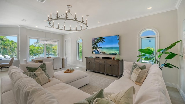 living room featuring a notable chandelier and ornamental molding