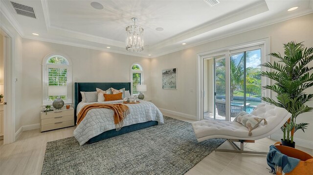 510 Bowsprit Ln, Longboat Key, FL 34228 - bedroom with a raised ceiling, multiple windows, access to exterior, crown molding, and recessed lighting