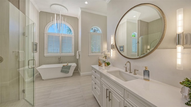 bathroom with tile patterned floors, vanity, separate shower and tub, and crown molding