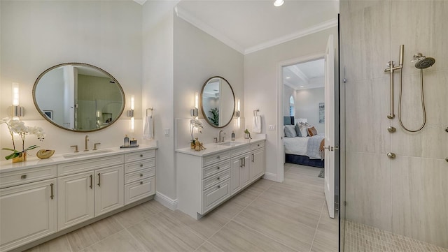 bathroom featuring tile patterned floors, vanity, a shower, and crown molding