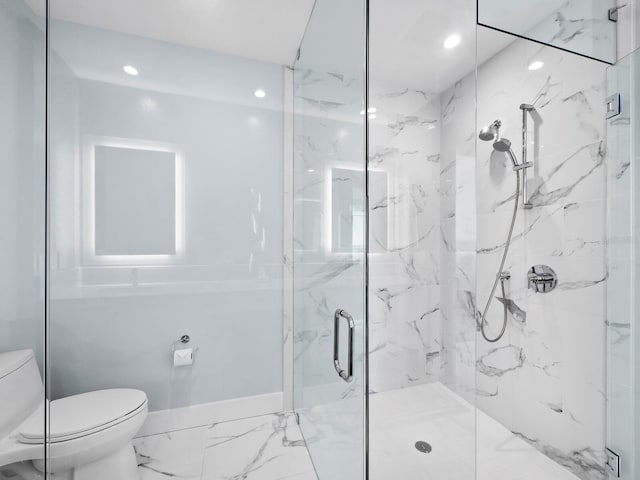 bathroom with toilet and walk in shower