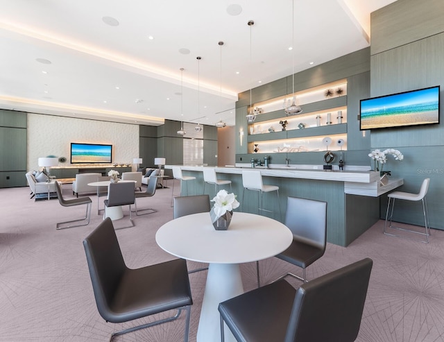 view of carpeted dining area