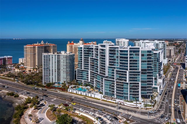 drone / aerial view with a water view