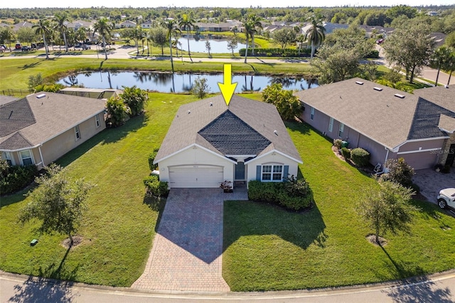 drone / aerial view with a water view