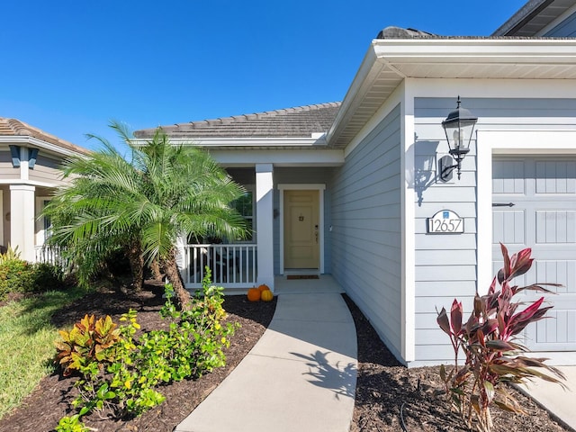 property entrance featuring a garage