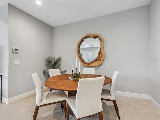 dining room featuring light tile patterned flooring