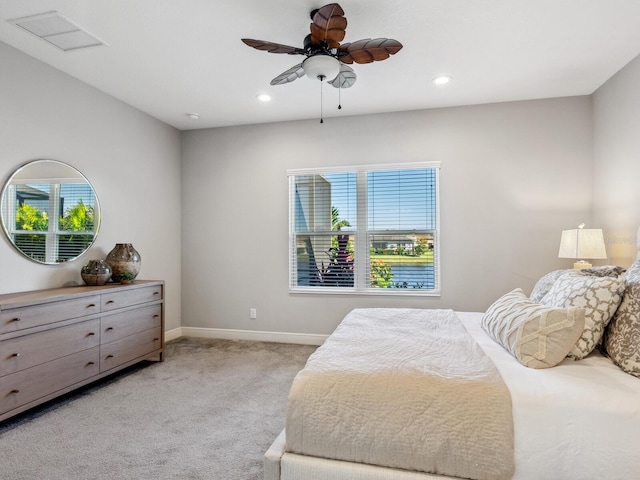 carpeted bedroom featuring ceiling fan