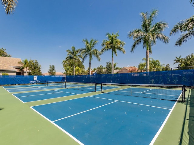 view of sport court featuring basketball hoop