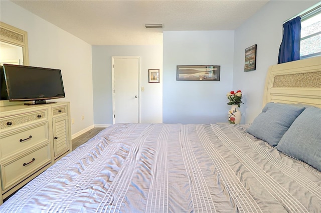 bedroom with a textured ceiling