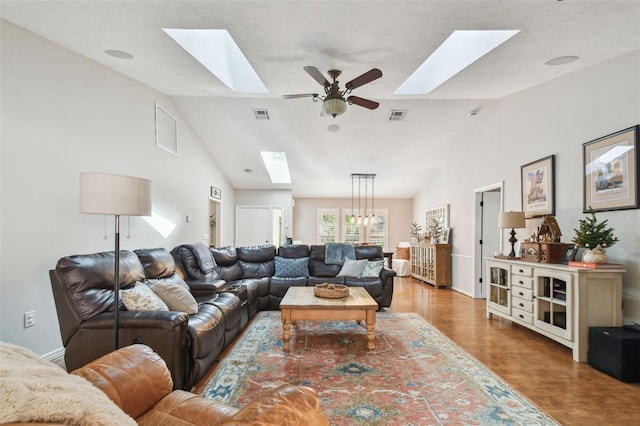 living room with wood-type flooring, ceiling fan, and lofted ceiling