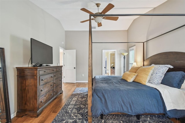 bedroom featuring wood-type flooring, ceiling fan, and lofted ceiling