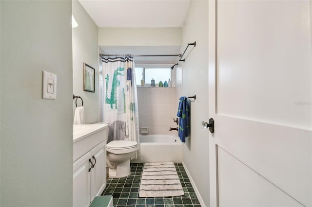 full bathroom with vanity, shower / tub combo, and toilet