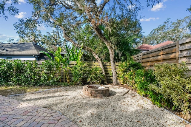 view of patio / terrace with a fire pit