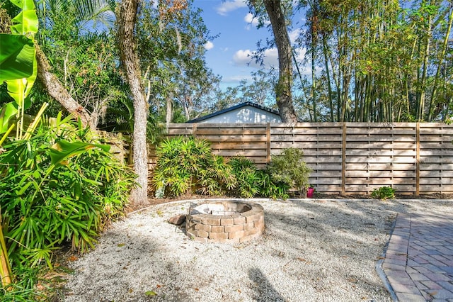 view of patio featuring an outdoor fire pit