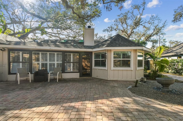 rear view of property with a patio