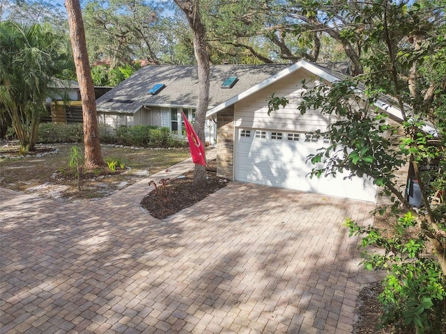 view of front of property featuring a garage