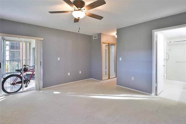 interior space featuring ceiling fan