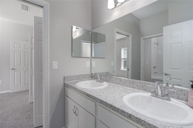 bathroom featuring vanity and walk in shower