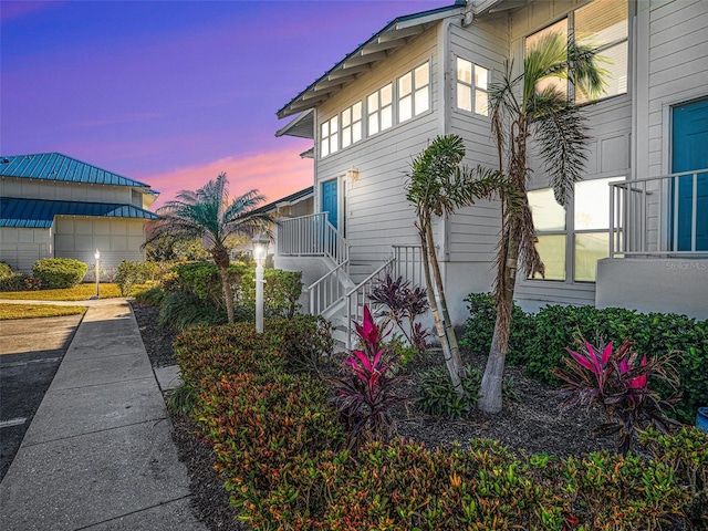 view of property exterior at dusk