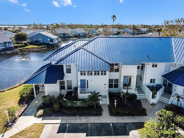 drone / aerial view featuring a water view