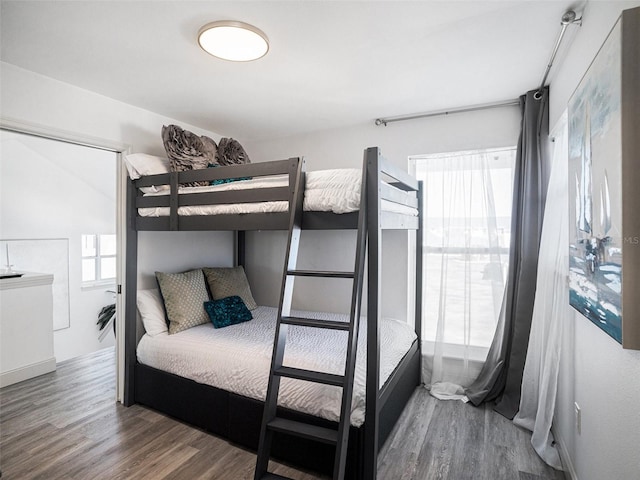 bedroom with wood-type flooring