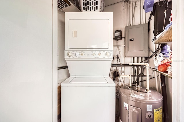 665 Park Cir Unit 58, Bradenton, FL 34207 - laundry area featuring stacked washer and clothes dryer, electric panel, and water heater
