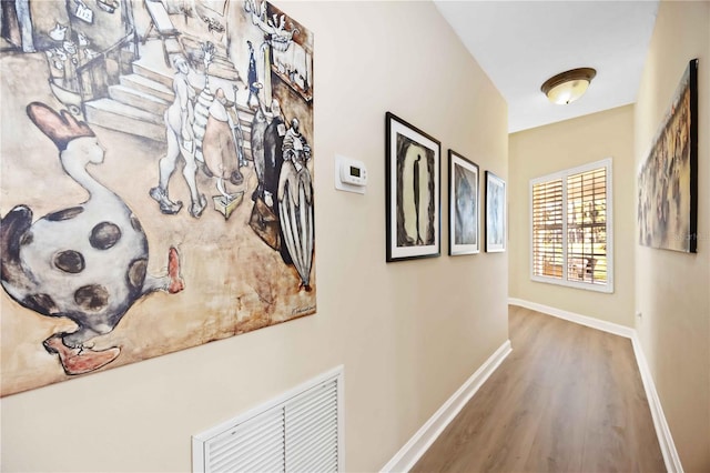 hallway featuring wood-type flooring