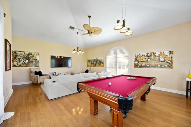 playroom featuring hardwood / wood-style flooring, vaulted ceiling, ceiling fan, and pool table