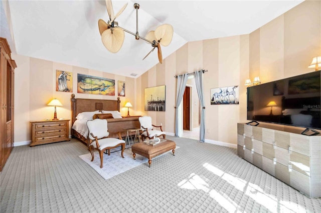 bedroom featuring carpet and vaulted ceiling