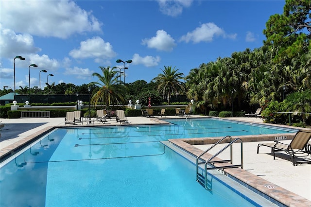 view of swimming pool featuring a patio