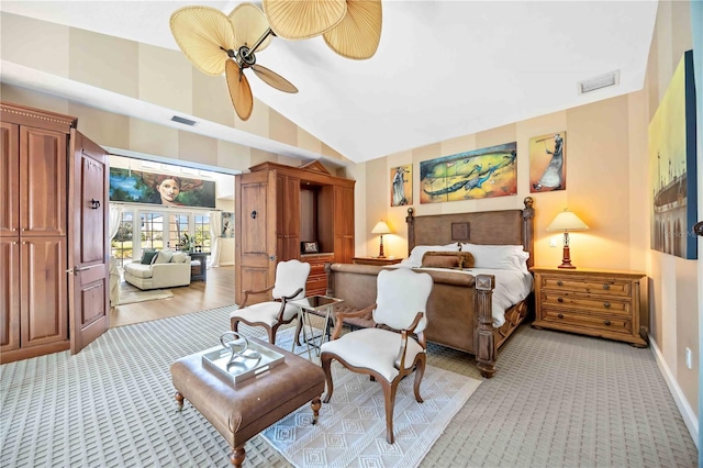 carpeted bedroom with high vaulted ceiling and ceiling fan