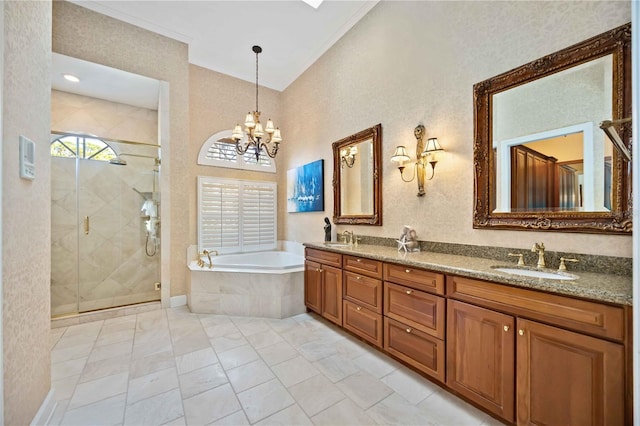 bathroom featuring vanity, separate shower and tub, ornamental molding, and a chandelier