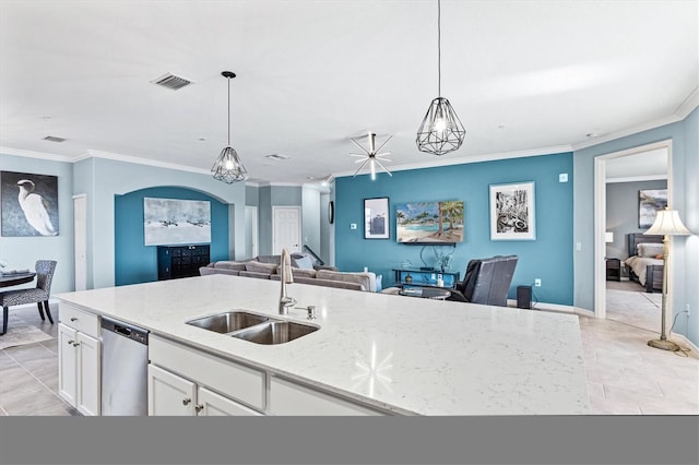 kitchen with light stone countertops, sink, decorative light fixtures, dishwasher, and white cabinetry