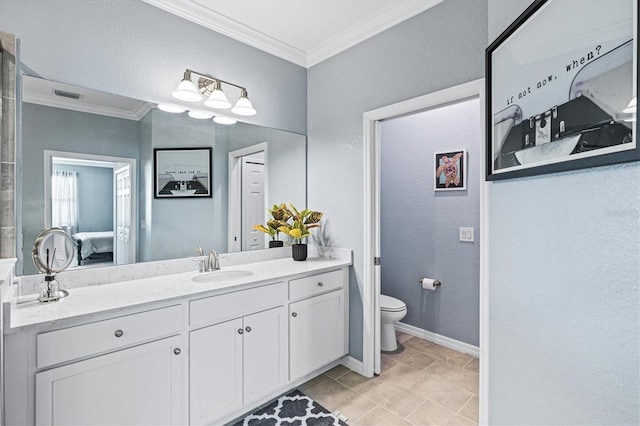 bathroom with crown molding, tile patterned flooring, vanity, and toilet