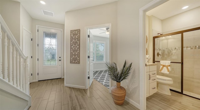 entrance foyer with light wood-type flooring