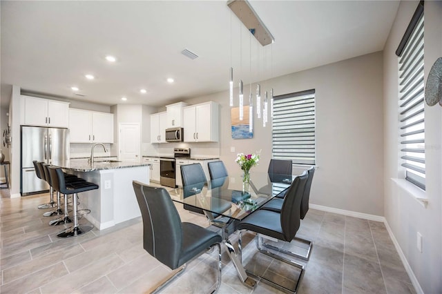 dining area with sink