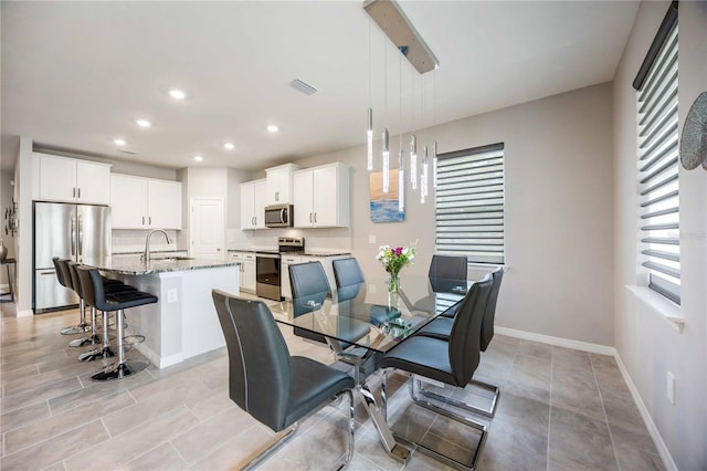 12689 Promenade Estates Blvd, Sarasota, FL 34238 - dining space with recessed lighting and baseboards
