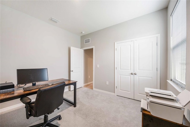 office area with light carpet