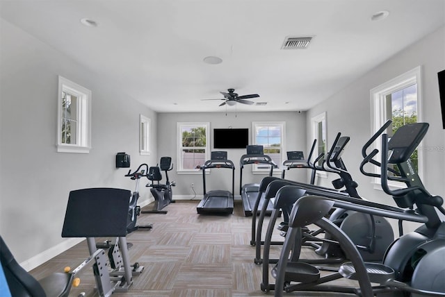 exercise room featuring ceiling fan