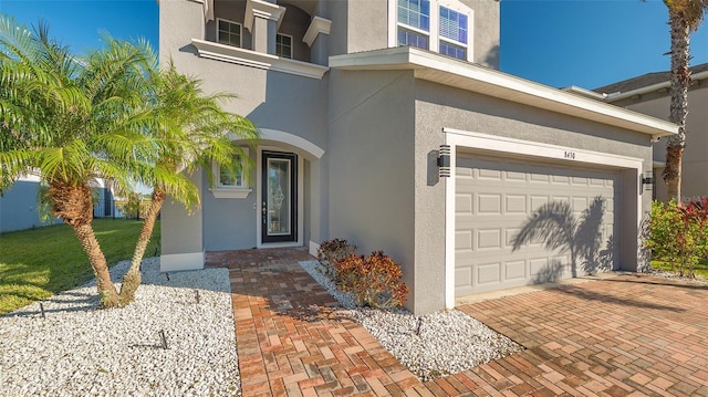 property entrance with a garage