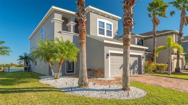 exterior space featuring a front yard and a garage