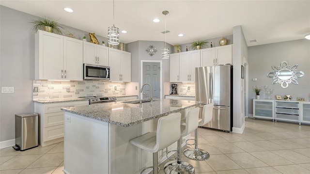 kitchen with white cabinets, sink, and stainless steel appliances