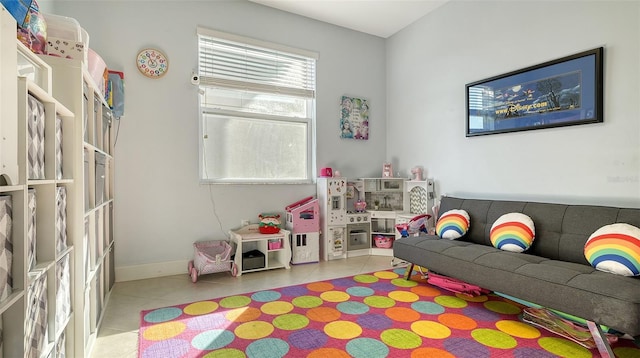 recreation room featuring light tile patterned floors