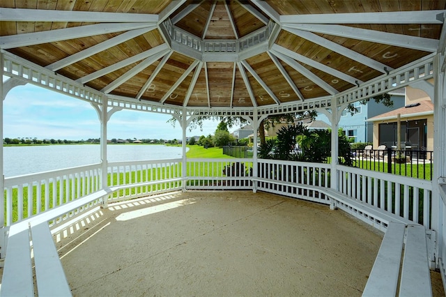 view of patio / terrace with a gazebo and a water view