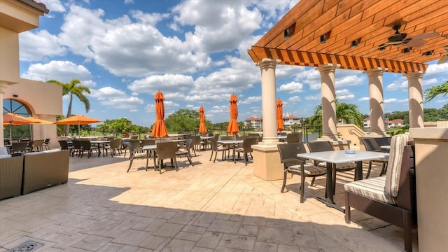 view of patio with a pergola and ceiling fan