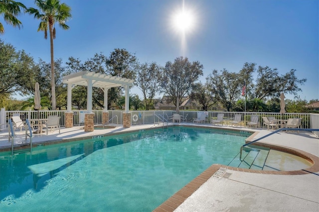 view of pool featuring a pergola and a patio area