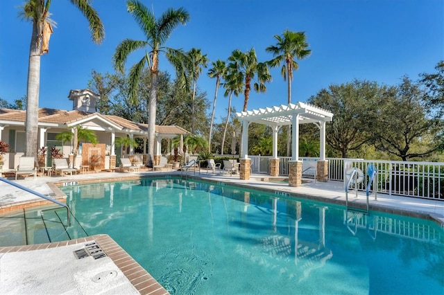 view of pool with a pergola and a patio area