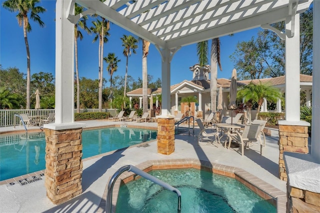 view of pool featuring a patio area, a pergola, and a hot tub