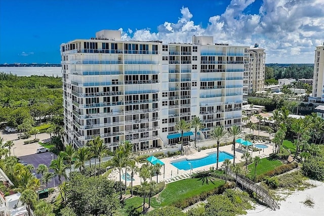 view of building exterior with a water view