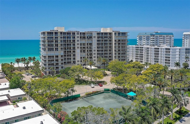 view of building exterior with a water view